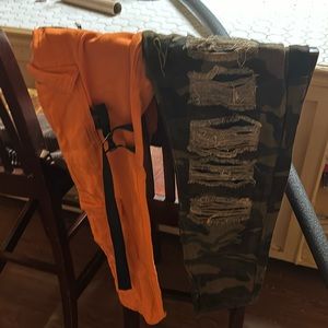 Orange and camouflage jeans size medium (32-33)